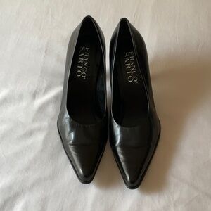 4 in black leather high heels.